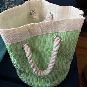 NWT fabric basket, with two rope handles, round, green and cream.